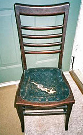 Dissassembled heirloom chair, before repair by Home Enhancements.