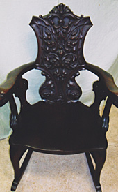 Carved back rocker, after repair by Home Enhancements.