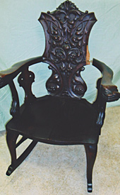 Carved back rocker, before repair by Home Enhancements.