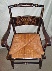 Hitchcock chair, before repair by Home Enhancements.