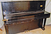 Piano, before restoration by Home Enhancements.