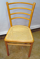 Woven chair seat, after repair by Home Enhancements.